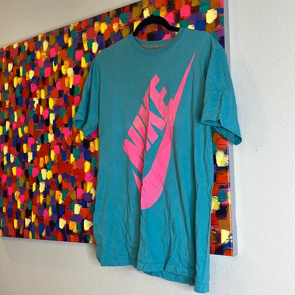 Blue shirt with pink Nike logo - Picture 1 of 1